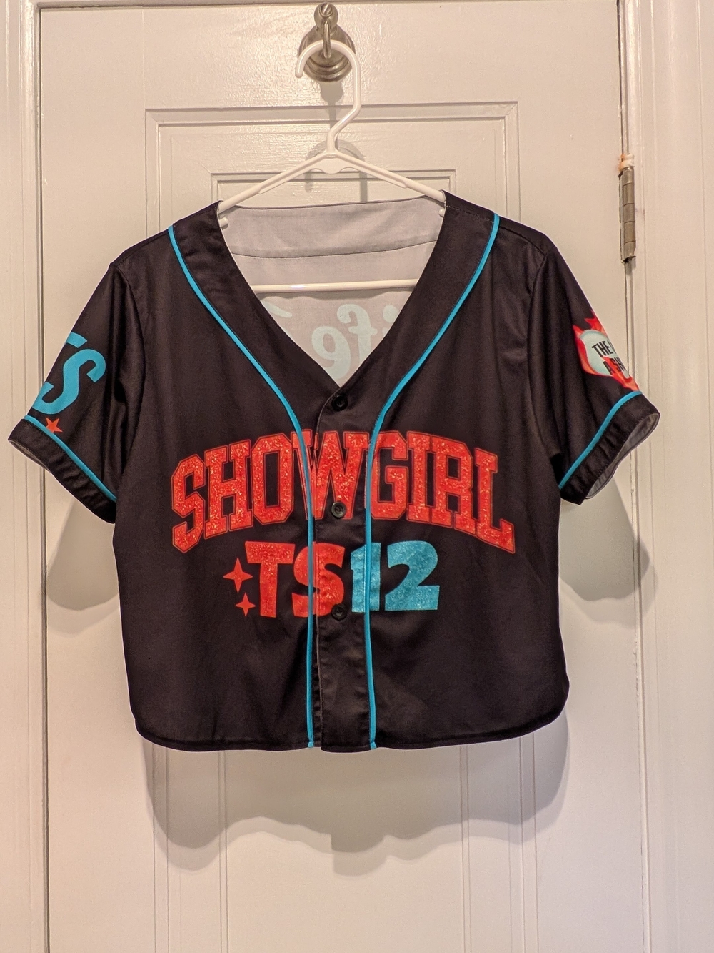 Swifties! Lfe Of A Showgirl TS12 Black Crop Jersey with Red & Aqua Blue Designs